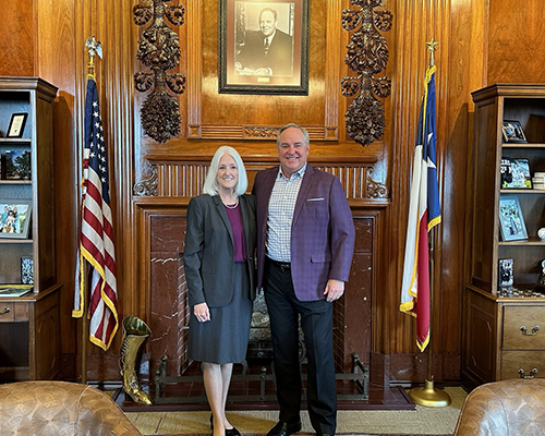Dr. Hensley and Texas A&M President Mark A. Welsh III