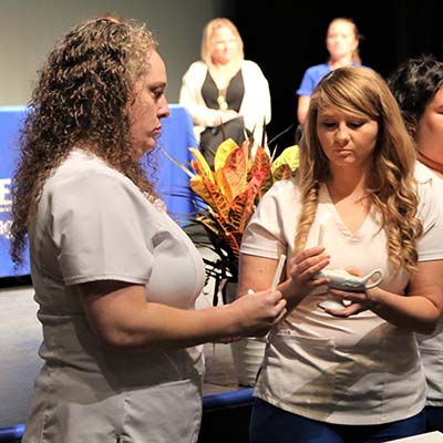 Blinn Vocational Nursing Program honors six graduates at pinning ceremony